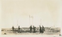 Image of Construction site; flag pole; church